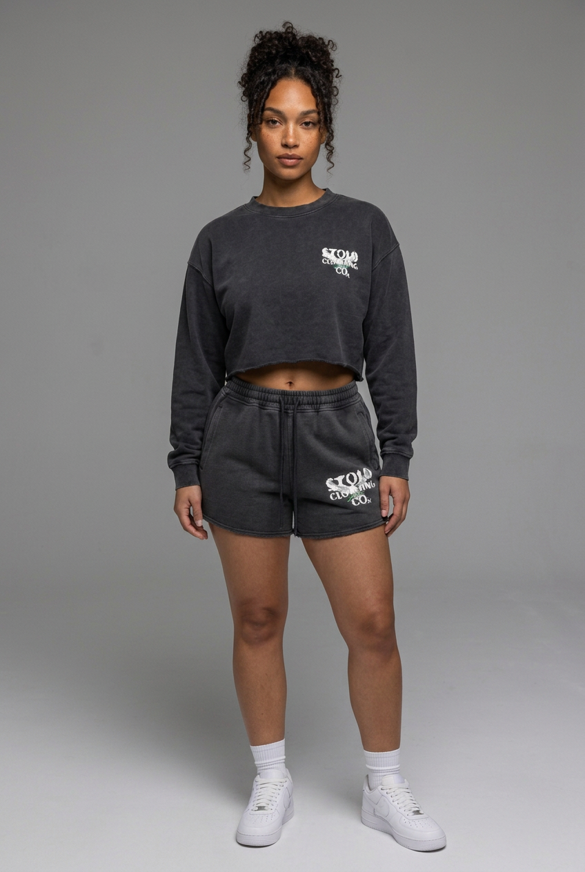 Adult model wearing the matching charcoal Birdies tee and shorts set
