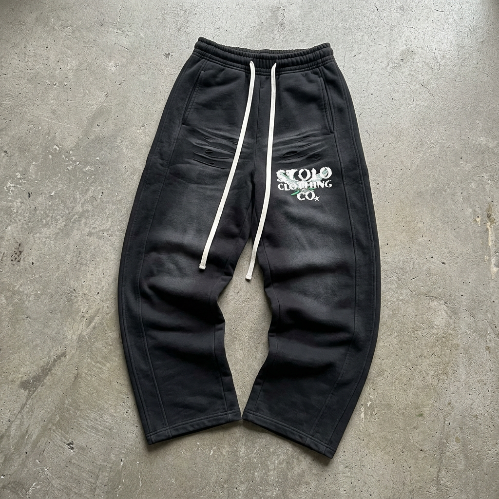 Birdies black curved blade sweatpants floor visual