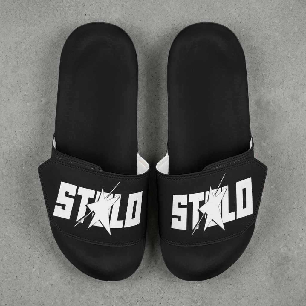 Black Starchild slides on grey concrete floor