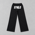 Black STOLO wide-leg pants front flat lay