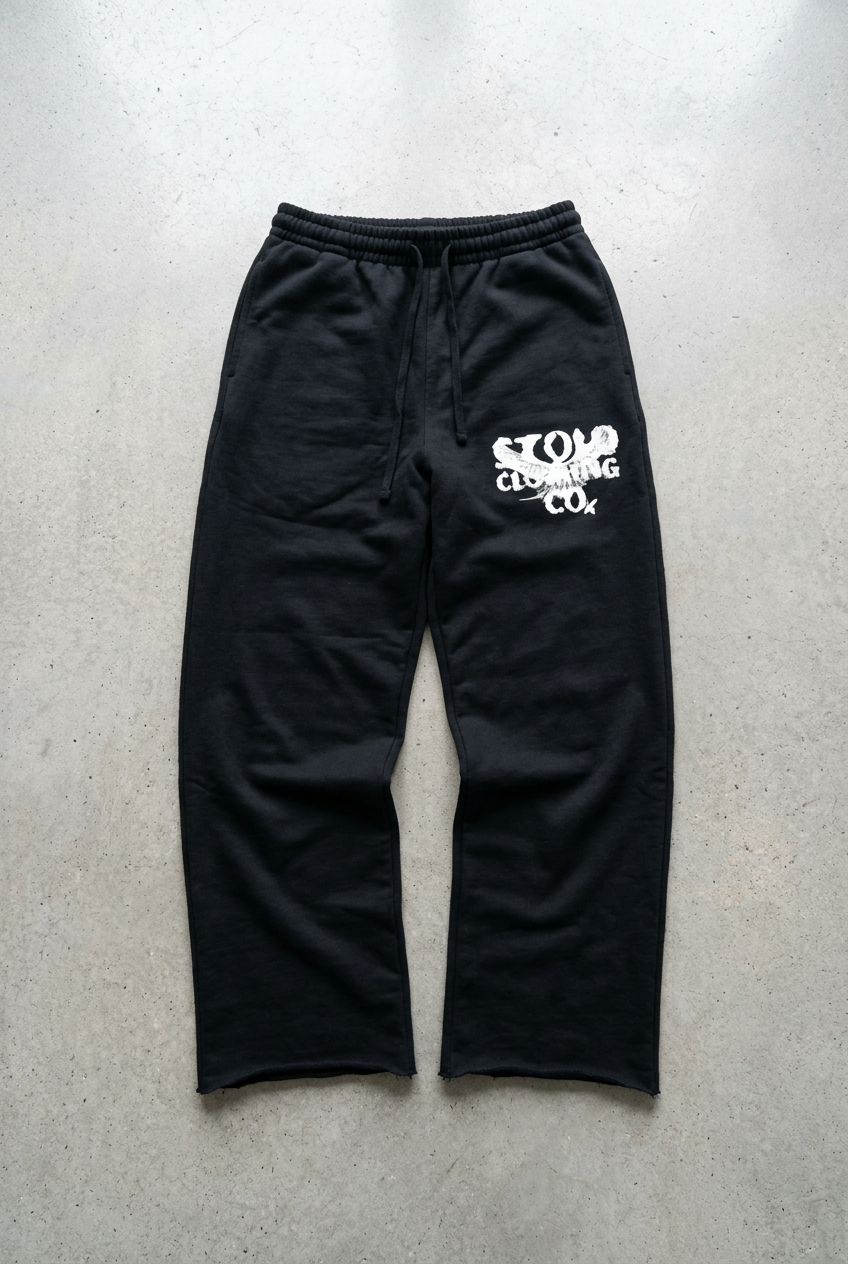 Black sweatpants floor-laid visual