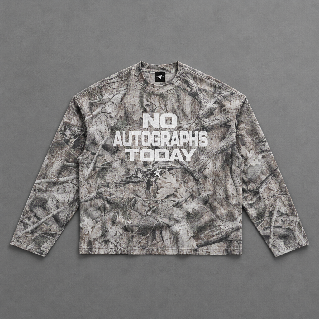Camo crewneck on grey studio floor