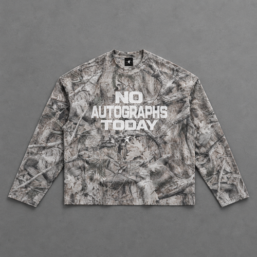 Camo crewneck on grey studio floor