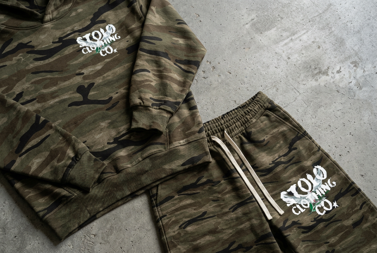 Camo set fabric, logos, and waistband floor detail