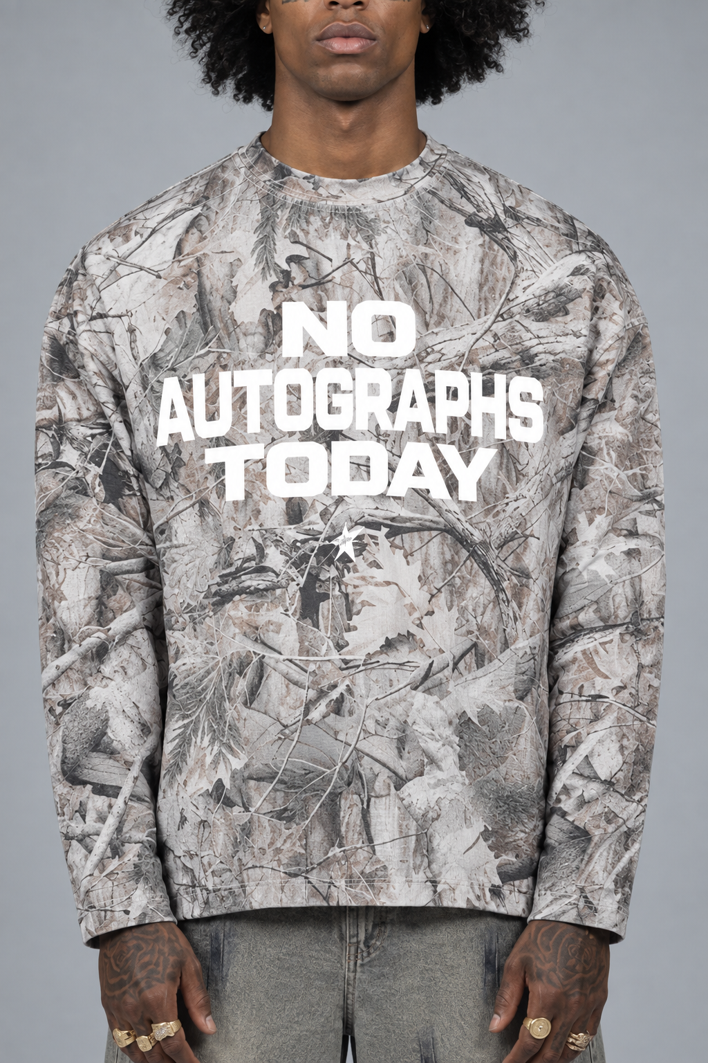 Close-up of the camo shirt on the model