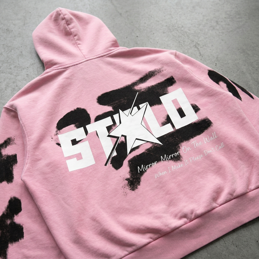 Close-up of the pink hoodie back with the correct Mirror Mirror wording
