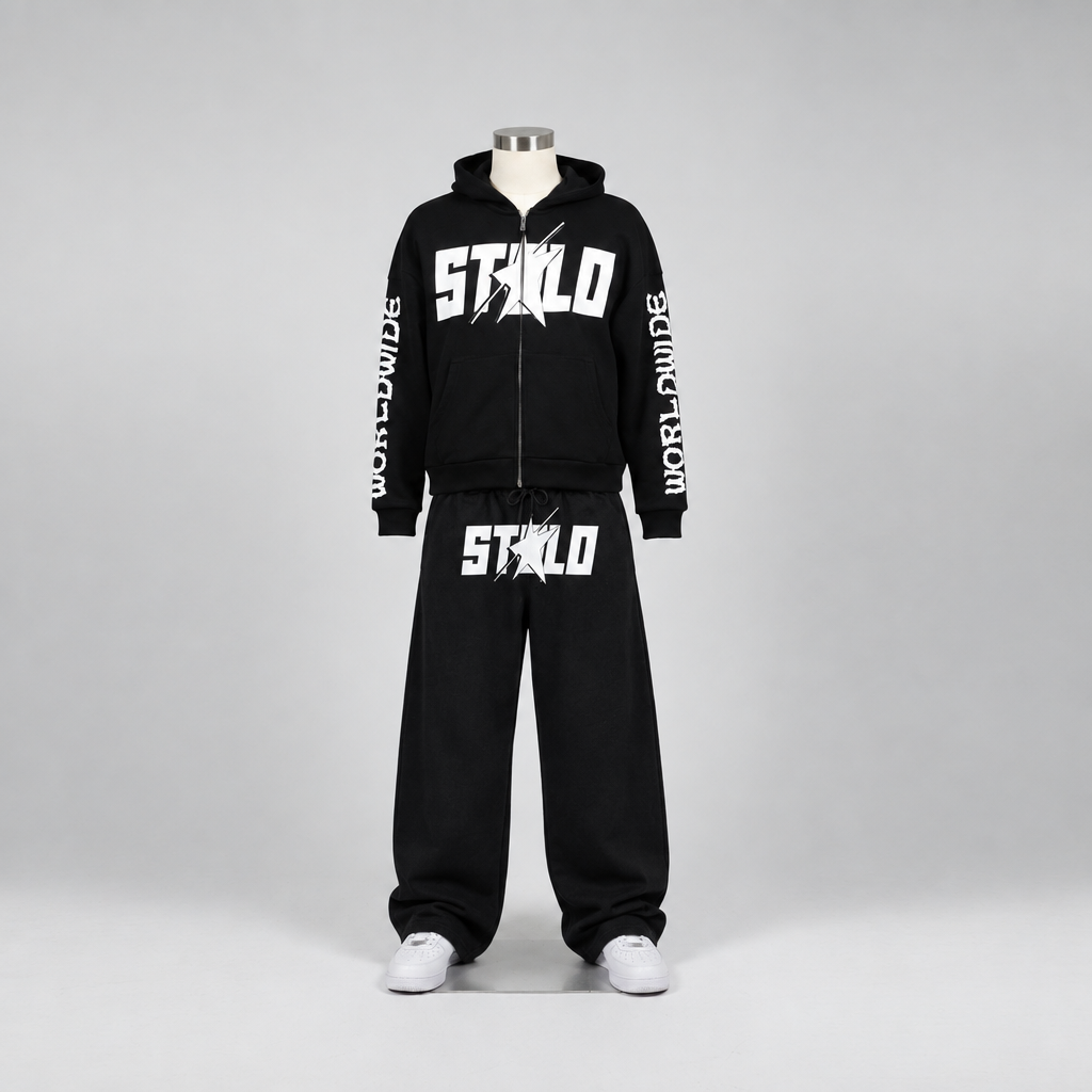 Front-view mannequin wearing the black STOLO zip hoodie and black wide-leg sweatpants