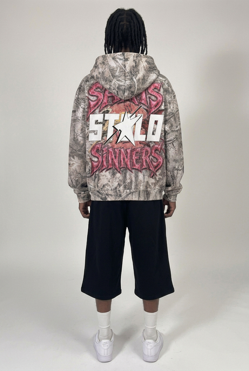 Fully zipped camo hoodie, back view