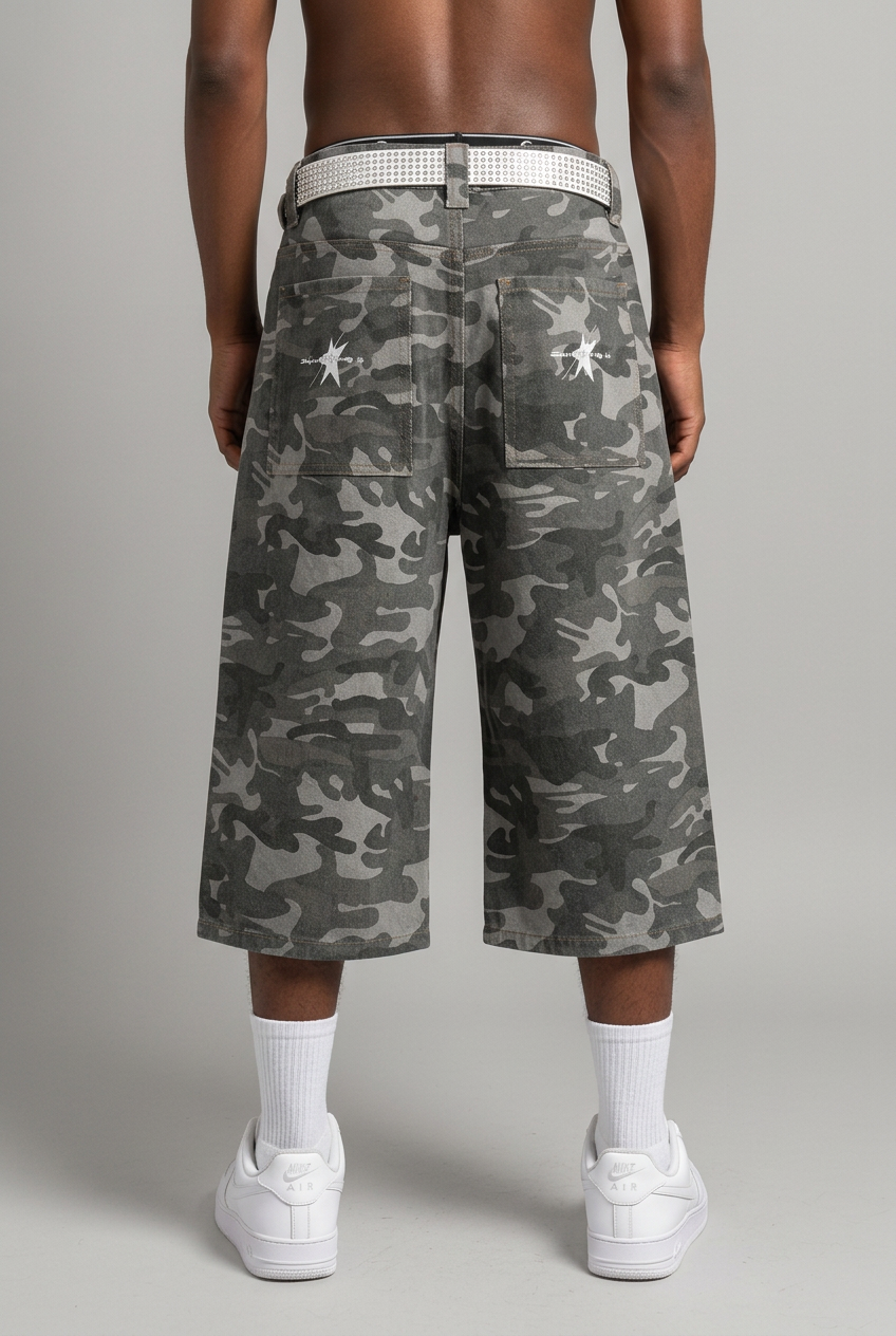 Grey camo shorts on model, back view