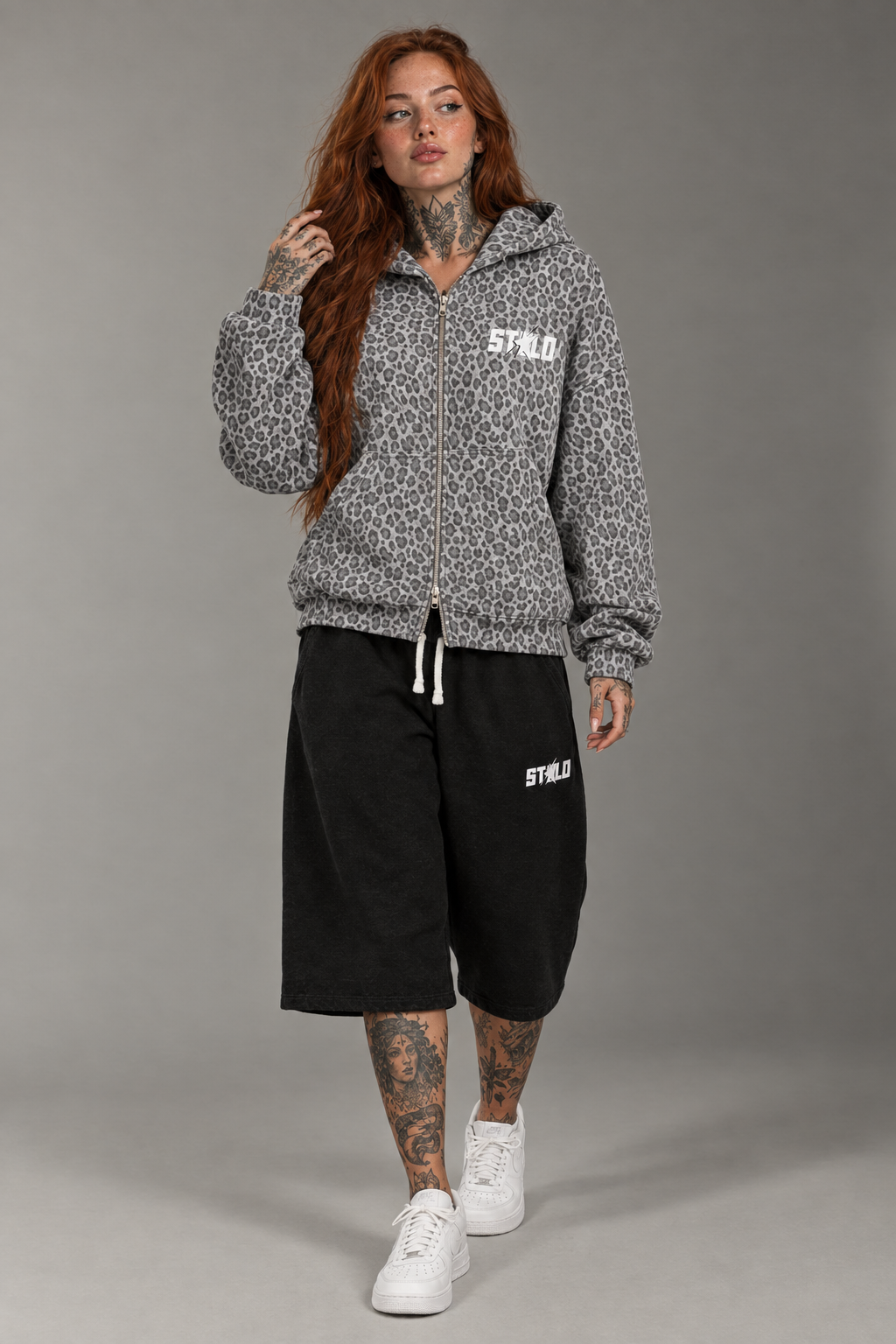 Light-gray leopard hoodie with baggy shorts and white Air Force Ones
