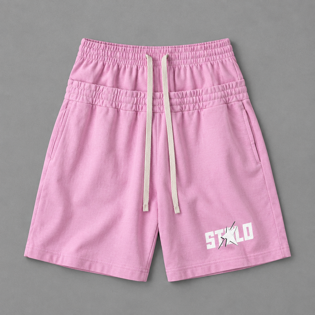 Light pink shorts on grey floor