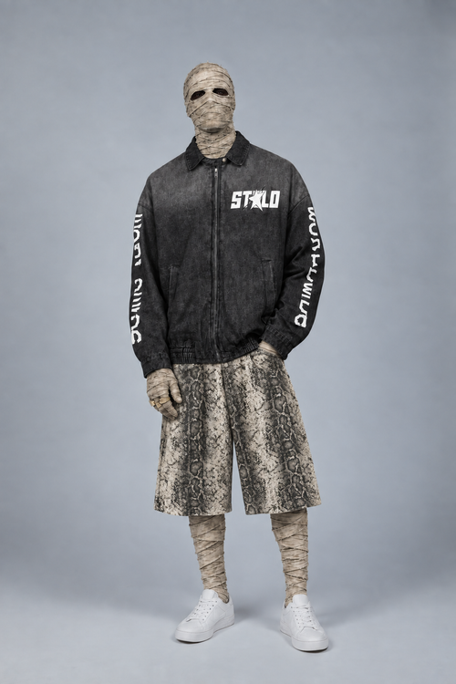 Mummy man wearing the exact snakeskin shorts