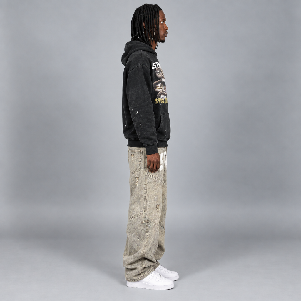Same model wearing the Still Shining hoodie, side view