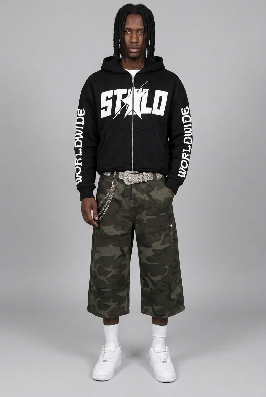 STOLO hoodie model in green camo shorts, relaxed front pose