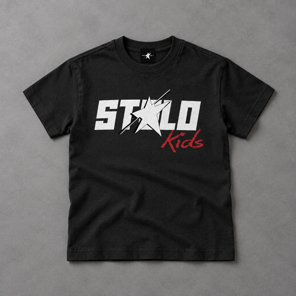 STOLO Kids tee on grey studio floor