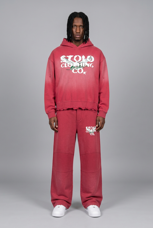 Usual STOLO model wearing the red hoodie and matching pants