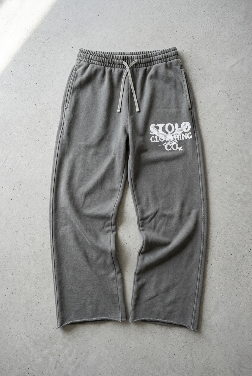 Washed-grey sweatpants floor-laid visual