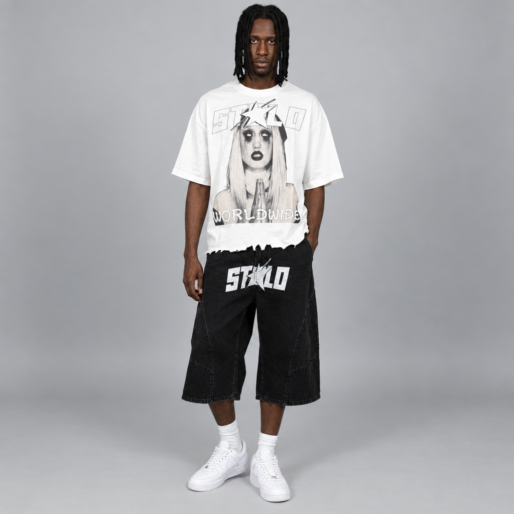 Your model in the white WORLDWIDE tee and black shorts