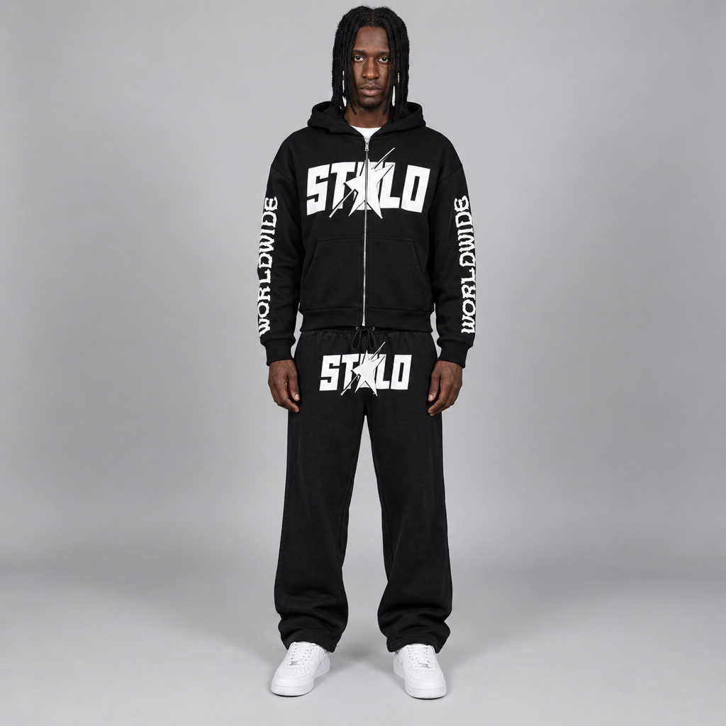 Your model wearing the black STOLO zip hoodie and wide-leg sweatpants